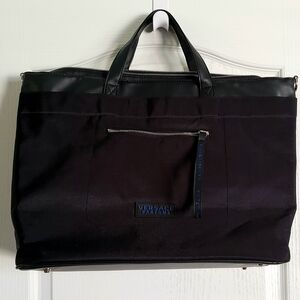 Versace Black Duffel Bag with Sturdy Fabric and Spacious Design